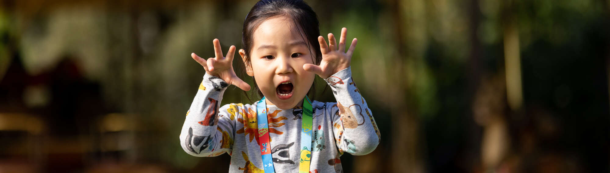 A girl roaring at the camera