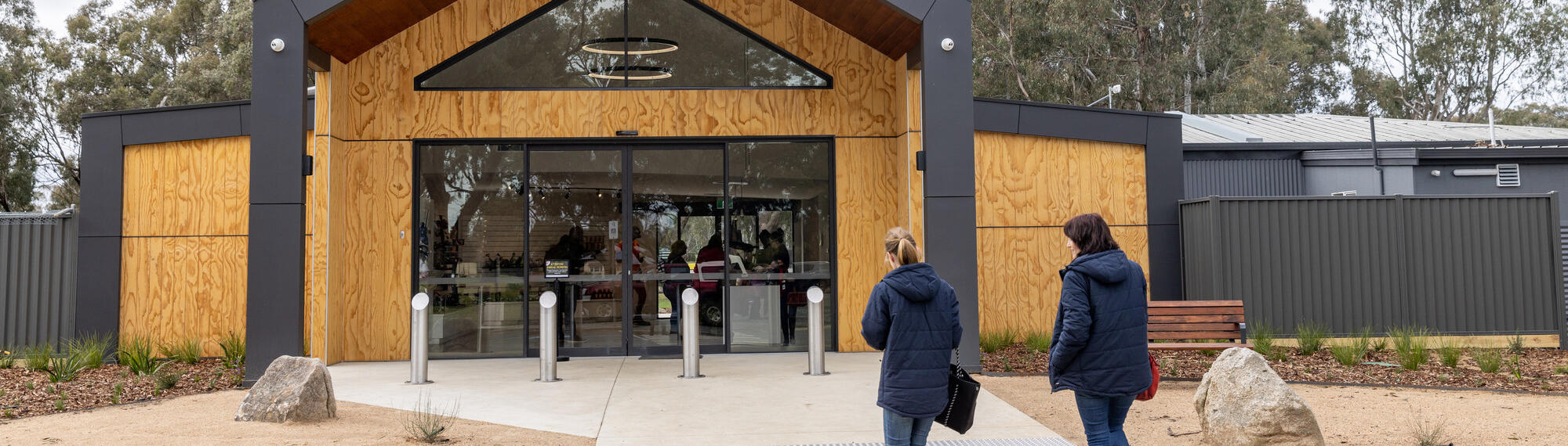 Two Women Walking Into Entrance Of Kyabram Fauna Park
