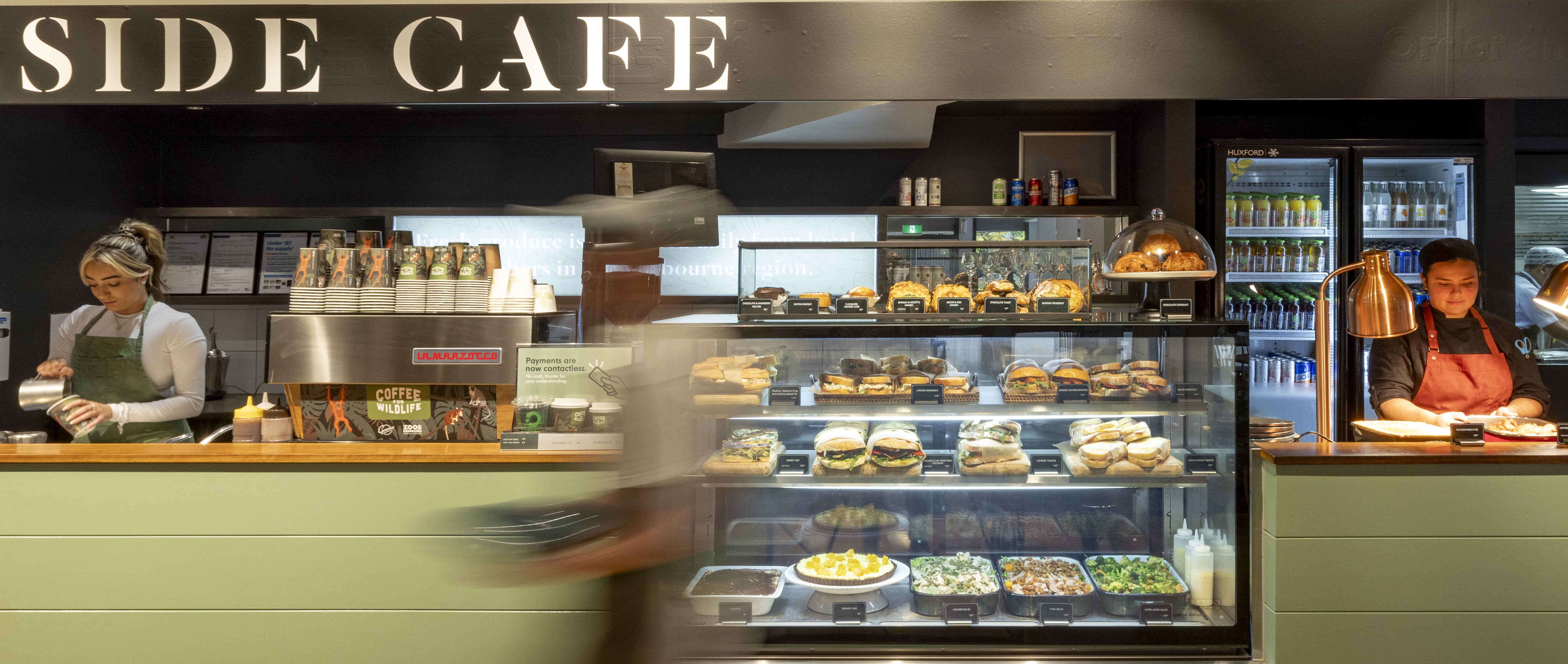 A timelapse view of the main counter at the Lakeside Café, with three staffers visible.