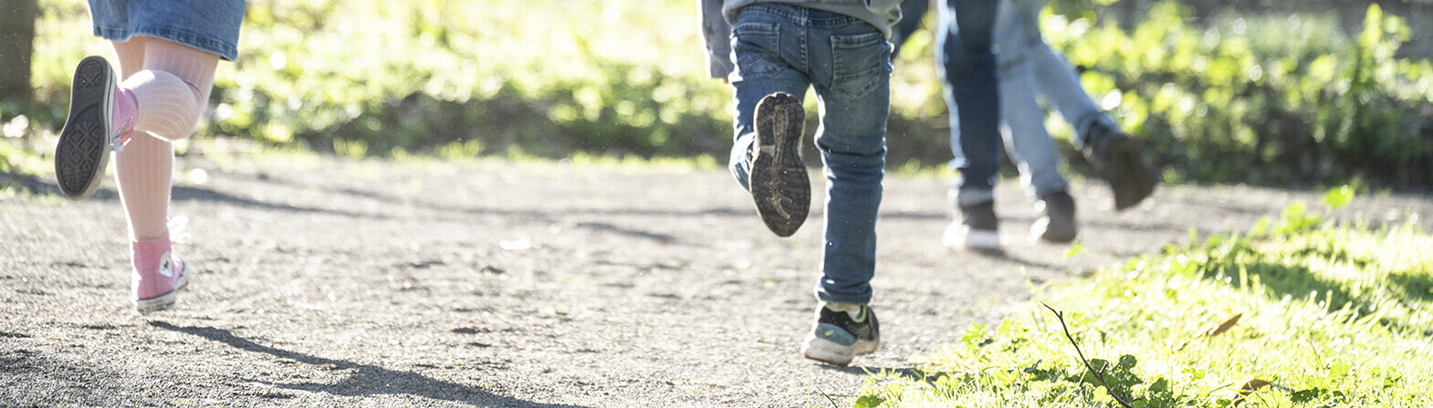 close up of kids' legs running